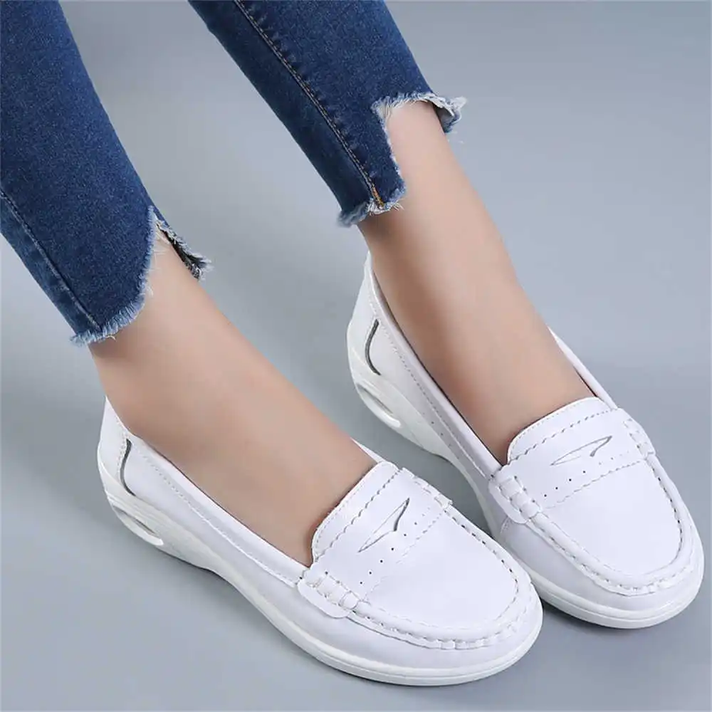 Women Accessories Shop Name Ideas - Thick Sole Slipon White Trainers For